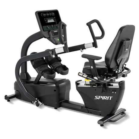 The Spirit Fitness CRS800S Recumbent Seated Stepper features a large digital display, adjustable seat with backrest, and foot pedals with straps.