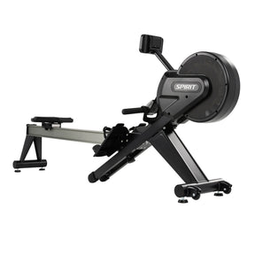 The Spirit Fitness CRW800 Rower by Spirit Fitness is a black and silver rowing machine with flywheel, seat, footrests, and display monitor, shown on a plain white background.