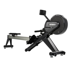 The Spirit Fitness CRW800 Rower by Spirit Fitness is a black and silver rowing machine with flywheel, seat, footrests, and display monitor, shown on a plain white background.
