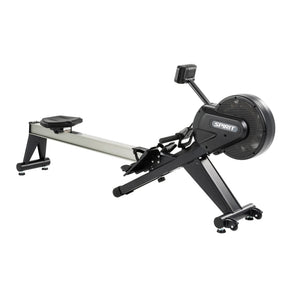 The Spirit Fitness CRW800 Rower by Spirit Fitness is a black and silver indoor rowing machine featuring a flywheel, footrests, adjustable seat, and digital display for effective fitness training.