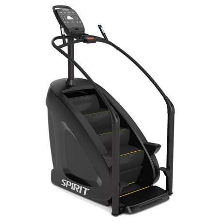 The Spirit Fitness CSC900 Stair Climber by Spirit Fitness is a black machine featuring handrails, a digital display, and four rotating steps with yellow accents.