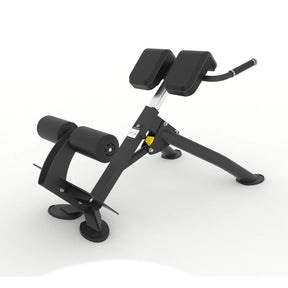 Rear angled view of the Spirit Fitness CSF-BEXT 45-Degree Back Extension showing the ankle roller pads and adjustable height column.
