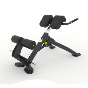 Rear angled view of the Spirit Fitness CSF-BEXT 45-Degree Back Extension showing the ankle roller pads and adjustable height column.