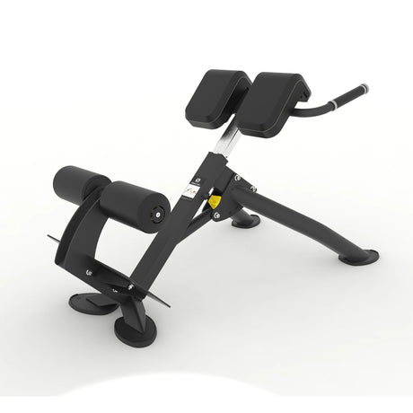 Rear angled view of the Spirit Fitness CSF-BEXT 45-Degree Back Extension showing the ankle roller pads and adjustable height column.