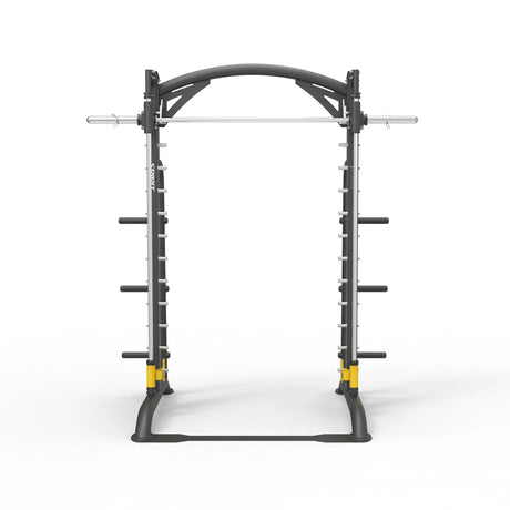 Front view of the Spirit Fitness CSF-SMTH Smith Machine showing the counterbalanced bar, arched top rail, and yellow safety catches on the base.