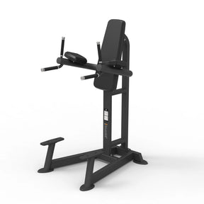 Angled view of the Spirit Fitness CSF-VKRD Vertical Knee Raise/Dip Station showing the back pad, forearm rests, dip handles, and step-up platform.