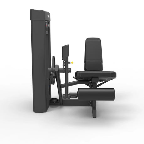 Side profile view of the Spirit Fitness CSS-LEXT Leg Extension showing the weight stack column, seat, and leg roller pad on its frame.
