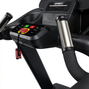 Close-up of the Spirit Fitness CT800ENT Treadmill control panel featuring red, green, and yellow buttons, a safety key with cord, metallic-accented handlebars, and the Spirit Fitness brand name above the display.
