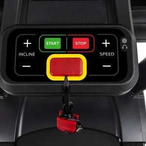 Close-up of the Spirit Fitness CT800ENT Treadmill control panel by Spirit Fitness, featuring incline and speed buttons, a green Start button, a red Stop button, and a large red emergency safety key with an attached clip.