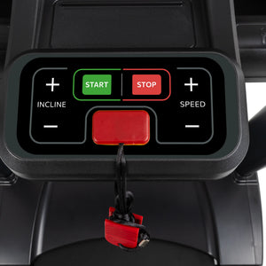 Close-up of the Spirit Fitness CT850 Treadmill console by Spirit Fitness, displaying incline and speed buttons, green start and red stop controls, plus a red safety key with cord below the panel.