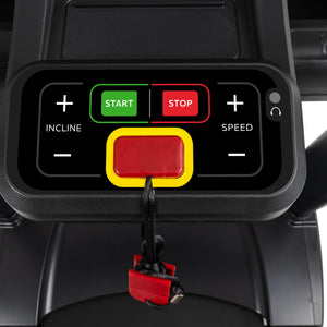 Close-up of the Spirit Fitness CT850ENT Treadmill control panel by Spirit Fitness, featuring large START (green) and STOP (red) buttons, incline and speed controls, plus a red safety key attached by a cord below the buttons.