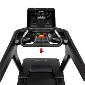 The Spirit Fitness CT900 Treadmill features a digital control panel with workout stats display, speed/incline/start-stop buttons, a red safety key, and sturdy handrails for secure use.