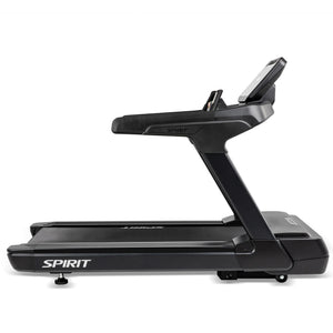 Side view of the Spirit Fitness CT900 Treadmill by Spirit Fitness, featuring a sleek black design with running deck, sturdy handlebars, and a digital console display—ideal for indoor workouts.