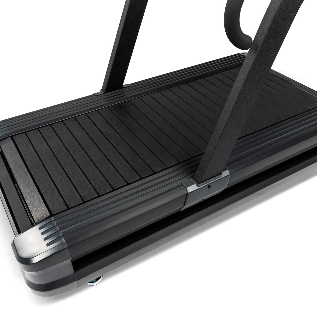 Close-up of the Spirit Fitness CTSBS900 curved slat belt and corner leveling foot.