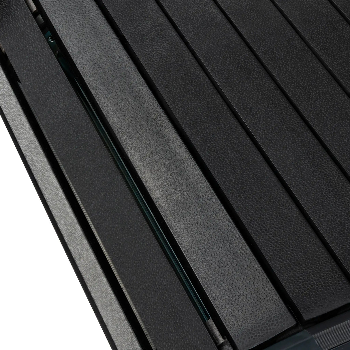 Extreme close-up of the Spirit Fitness CTSBS900 slat belt segments showing the textured deck surface.