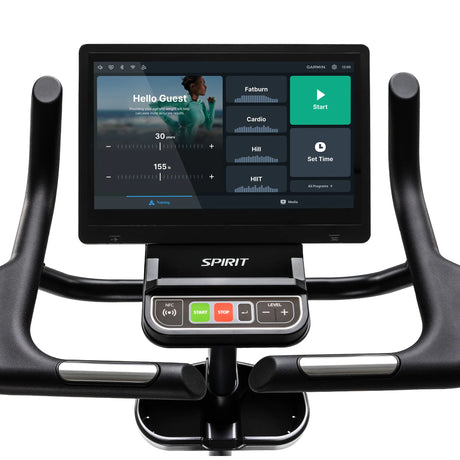 Close-up of the Spirit Fitness CU1000ENT Upright Bike touchscreen console displaying the training menu with Fatburn, Cardio, Hill, and HIIT program options plus a green Start button. Below the screen are physical NFC, Start, Stop, and Level buttons flanked by contact heart-rate grip handlebars. Brand: Spirit Fitness.