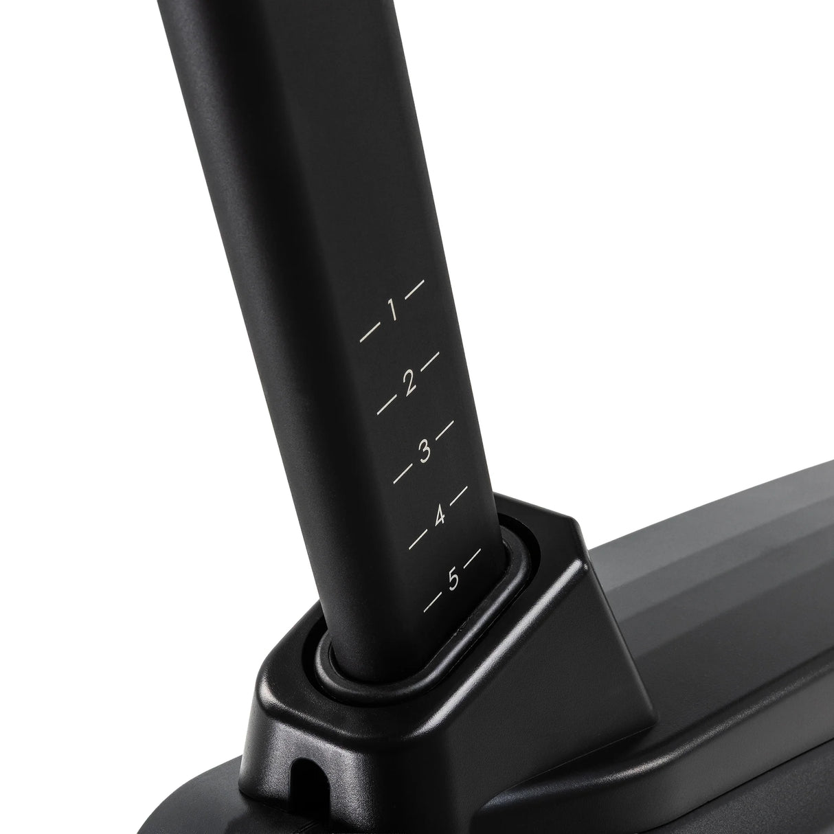 Close-up of the Spirit Fitness CU1000ENT Upright Bike seat post sliding into the frame collar, showing the numbered 1 through 5 height-adjustment markings.
