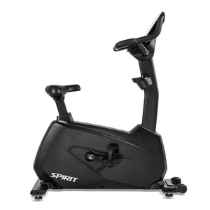 Side profile of the black Spirit Fitness CU1000ENT Upright Bike highlighting the step-through frame design, seat post, pedal crank, and base with leveling feet.
