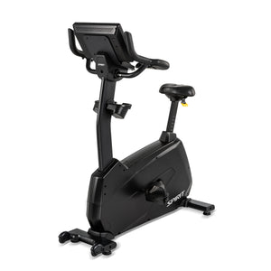 Rear three-quarter angle of the Spirit Fitness CU1000ENT Upright Bike showing the back of the console, handlebar grips, seat, and full frame down to the base and transport wheels.