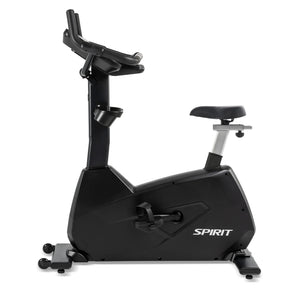 The Spirit Fitness CU800 Upright Bike features a black frame, adjustable seat, pedals, and handlebars. The Spirit Fitness brand name is visible on the bike's base.
