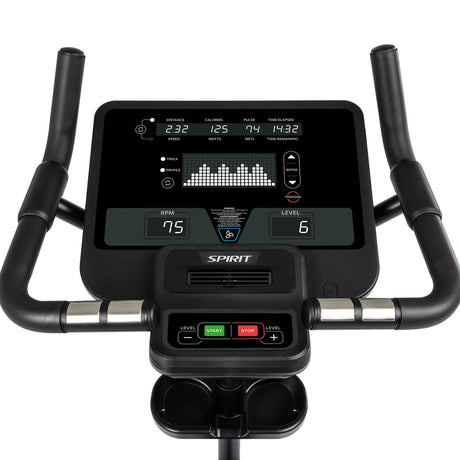 Close-up of the Spirit Fitness CU800 Upright Bike’s digital console displaying distance, calories, pulse, time, RPM, and resistance. The Spirit Fitness bike’s handlebars and start/stop/level controls are also shown.