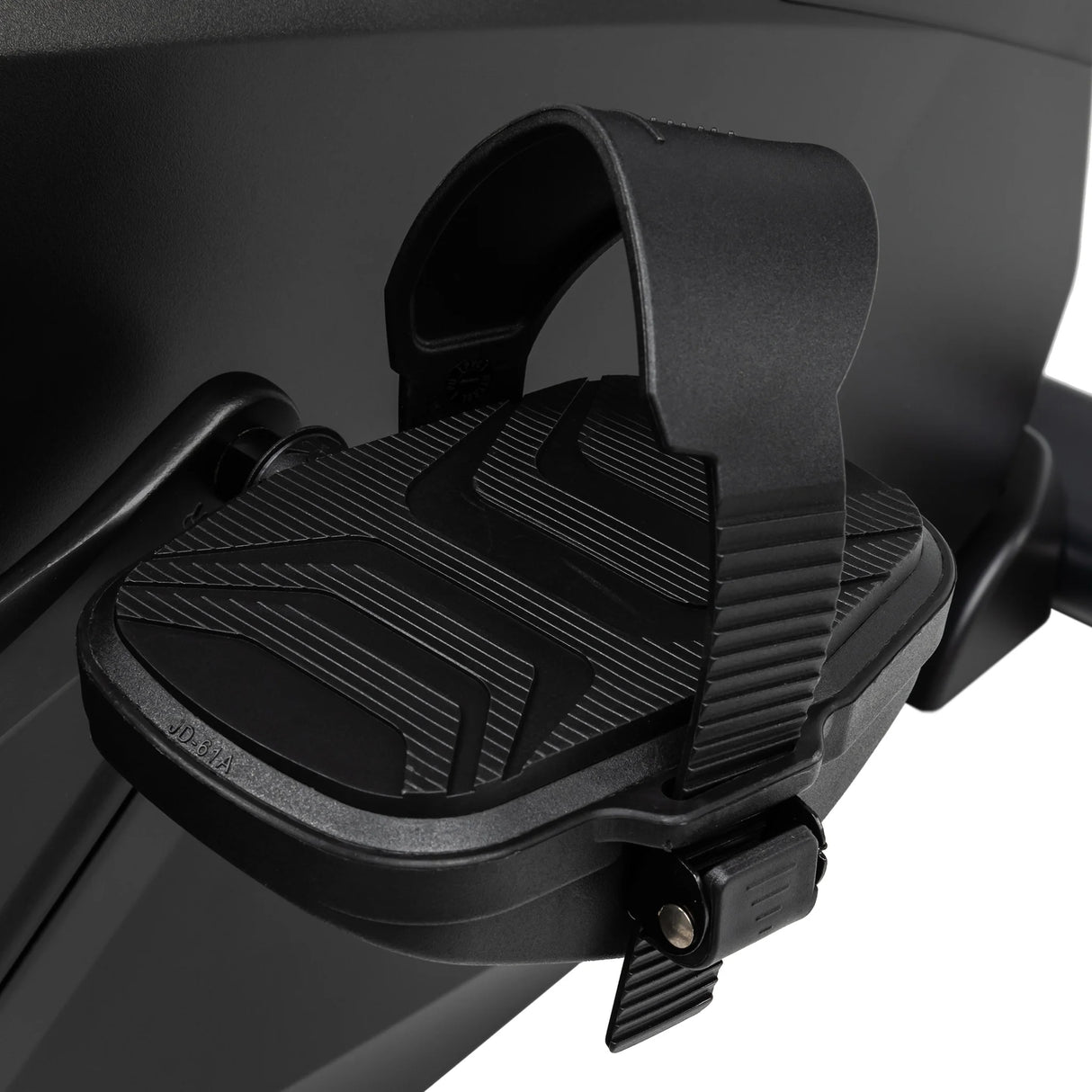 Close-up of the Spirit Fitness CU800 Upright Bike's black pedal featuring a wide, textured surface and adjustable foot strap, attached to the dark-colored frame by Spirit Fitness.