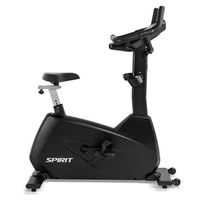 The Spirit Fitness CU800ENT Upright Bike by Spirit Fitness is a black stationary exercise bike with adjustable seat and handlebars, pedals, and the brand name printed on the frame, shown from a side view on a flat surface.