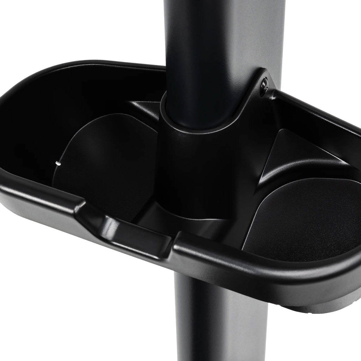 Close-up of a black plastic tray with multiple compartments for small items, attached to a vertical pole on the Spirit Fitness CU900 Upright Bike by Spirit Fitness.