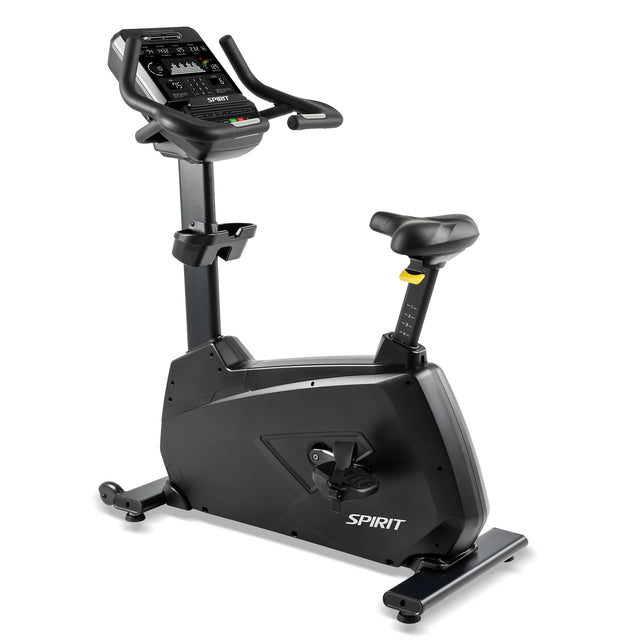 The Spirit Fitness CU900 Upright Bike is a black exercise bike with an electronic display, adjustable seat and pedals, featuring the Spirit Fitness brand name on its base.