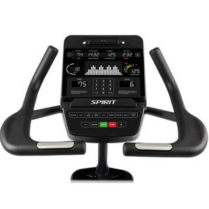 Close-up of the Spirit Fitness CU900 Upright Bike console by Spirit Fitness, featuring a digital screen showing stats like time, calories, heart rate, and speed, with control buttons and two black handlebars on each side.